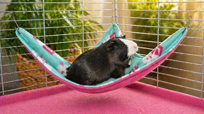 Made with ultra-soft fleece and strong, secure hooks, it easily attaches to any cage corner to create a snug, elevated bed your pet will love. This space-saving hanging bed is perfect for guinea pigs, rats, ferrets, and other small animals who love to relax in warmth and comfort.